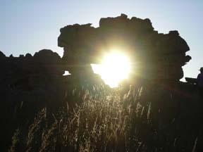 Sun shining through a hole in the Isalo Mountains in Madagascar